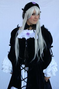 Rating: Safe Score: 0 Tags: 1girl black_dress blue_background closed_mouth dress frills gothic_lolita lips lolita_fashion long_hair long_sleeves solo standing suigintou white_hair User: admin