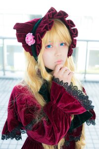 Rating: Safe Score: 0 Tags: 1girl bangs blonde_hair blue_eyes blurry blurry_background bonnet bow capelet depth_of_field dress flower lolita_fashion long_hair long_sleeves looking_at_viewer photo red_dress rose shinku solo User: admin