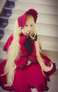 Rating: Safe Score: 0 Tags: 1girl blonde_hair blurry bonnet depth_of_field dress long_hair long_sleeves looking_at_viewer photo red_dress shinku sitting solo very_long_hair User: admin