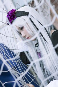 Rating: Safe Score: 0 Tags: 1girl bangs blurry blurry_background blurry_foreground depth_of_field eyelashes flower gothic_lolita hair_flower hair_ornament lace lips lolita_fashion long_hair motion_blur profile ribbon solo suigintou white_hair User: admin