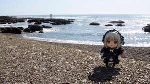 Rating: Safe Score: 0 Tags: 1girl gothic_lolita hairband long_sleeves ocean photo_background red_eyes snow solo virtual_youtuber water User: admin