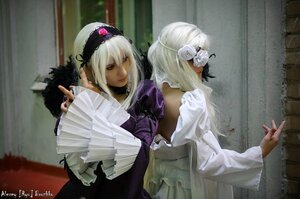 Rating: Safe Score: 0 Tags: 2girls black_dress choker dress flower frills hair_ornament long_sleeves multiple_cosplay multiple_girls suigintou tagme white_hair User: admin