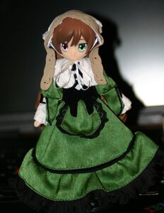 Rating: Safe Score: 0 Tags: 1girl auto_tagged brown_hair doll dress green_dress green_eyes heterochromia long_sleeves looking_at_viewer red_eyes solo suiseiseki User: admin
