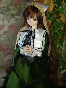 Rating: Safe Score: 0 Tags: 1girl brown_hair doll dress frills green_dress green_eyes heterochromia long_hair long_sleeves looking_at_viewer plant red_eyes solo suiseiseki User: admin