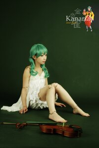 Rating: Safe Score: 0 Tags: 1girl barefoot dress green_eyes green_hair joints kanaria realistic sitting solo white_dress User: admin