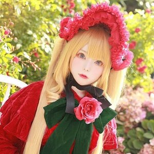 Rating: Safe Score: 0 Tags: 1girl bangs blonde_hair blue_eyes blurry day depth_of_field flower lips long_hair looking_at_viewer outdoors pink_flower pink_rose red_flower red_rose red_shirt rose shinku solo upper_body User: admin