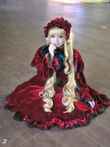 Rating: Safe Score: 0 Tags: 1girl blonde_hair blue_eyes dress flower frills lips long_hair long_sleeves looking_at_viewer red_dress rose shinku sitting solo very_long_hair User: admin