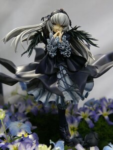 Rating: Safe Score: 0 Tags: 1girl black_wings blurry blurry_foreground depth_of_field doll dress flower frilled_sleeves frills hairband long_hair long_sleeves ribbon silver_hair solo standing suigintou very_long_hair white_flower wings User: admin