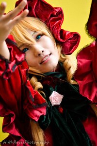 Rating: Safe Score: 0 Tags: 1girl blonde_hair blue_eyes blurry bow depth_of_field drill_hair flower lips looking_at_viewer portrait rose shinku smile solo User: admin