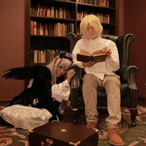 Rating: Safe Score: 0 Tags: 1boy 1girl blonde_hair book bookshelf chair couch feathers flower hair_over_one_eye library long_hair pants sitting solo suigintou wings User: admin