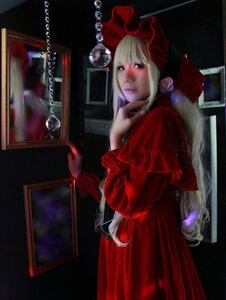 Rating: Safe Score: 0 Tags: 1girl blonde_hair blue_eyes bonnet curtains dress flower indoors lips long_hair long_sleeves red_dress shinku solo window User: admin