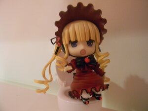 Rating: Safe Score: 0 Tags: 1girl blonde_hair blue_eyes bonnet bow chibi doll dress drill_hair long_hair long_sleeves looking_at_viewer open_mouth photo red_dress shinku shoes solo standing User: admin