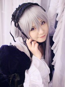 Rating: Safe Score: 0 Tags: 1girl closed_mouth frills hairband lips lolita_fashion long_hair long_sleeves looking_at_viewer purple_eyes realistic ribbon silver_hair solo suigintou User: admin