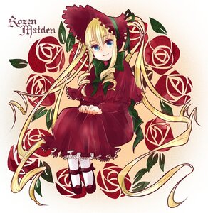 Rating: Safe Score: 0 Tags: 1girl blonde_hair blue_eyes bonnet bow bowtie dress drill_hair flower full_body green_bow image long_hair long_sleeves looking_at_viewer red_capelet red_dress shinku shoes sitting smile solo twintails very_long_hair User: admin