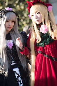 Rating: Safe Score: 0 Tags: 2girls bangs blonde_hair blunt_bangs bonnet dress flower hair_ornament hat lips long_hair long_sleeves looking_at_viewer multiple_cosplay multiple_girls realistic red_dress rose shinku siblings silver_hair sisters suigintou tagme User: admin