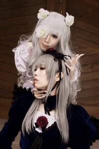 Rating: Safe Score: 0 Tags: 2girls dress flower frills hair_ornament lips long_hair long_sleeves multiple_cosplay multiple_girls rose suigintou tagme User: admin