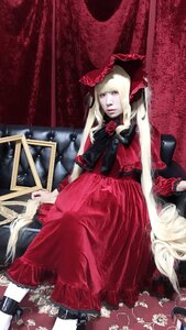 Rating: Safe Score: 0 Tags: 1girl blonde_hair blue_eyes bonnet bow dress flower gothic_lolita lace lips lolita_fashion long_hair red_dress rose shinku sitting solo very_long_hair User: admin