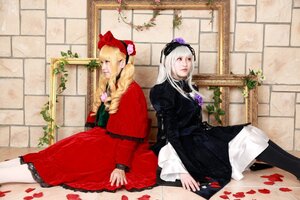 Rating: Safe Score: 0 Tags: 2girls blonde_hair bonnet dress flower hat long_hair long_sleeves looking_at_viewer multiple_cosplay multiple_girls shinku sitting suigintou tagme User: admin