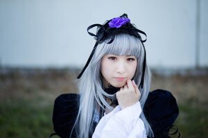 Rating: Safe Score: 0 Tags: 1girl bangs blunt_bangs blurry blurry_background closed_mouth depth_of_field dress flower hair_flower hair_ornament lips long_hair long_sleeves looking_at_viewer red_eyes ribbon solo suigintou upper_body User: admin