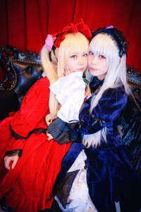 Rating: Safe Score: 0 Tags: 2girls blonde_hair blue_eyes dress flower frills gothic_lolita hairband hug lips lolita_fashion long_hair long_sleeves looking_at_viewer multiple_cosplay multiple_girls red_dress red_eyes rose shinku smile tagme User: admin