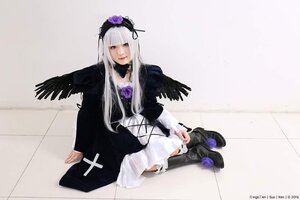 Rating: Safe Score: 0 Tags: 1girl bangs black_wings boots dress flower frills hairband lips long_hair long_sleeves looking_at_viewer silver_hair sitting solo suigintou wings User: admin