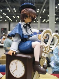 Rating: Safe Score: 0 Tags: 1boy blue_dress blue_eyes blurry blurry_background blurry_foreground bookshelf boots depth_of_field doll dress hat indoors long_sleeves motion_blur photo_background pocket_watch ribbon short_hair sitting solo souseiseki User: admin