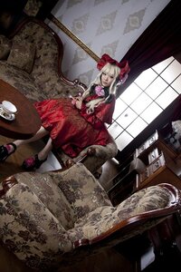 Rating: Safe Score: 0 Tags: 1girl blonde_hair bow cup curtains dress flower indoors red_dress saucer shinku sitting solo tea teacup teapot window User: admin