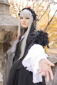 Rating: Safe Score: 0 Tags: 1girl blurry blurry_background blurry_foreground depth_of_field dress frills gothic_lolita hairband lips lolita_fashion long_hair long_sleeves looking_at_viewer outstretched_arm outstretched_hand silver_hair solo suigintou User: admin