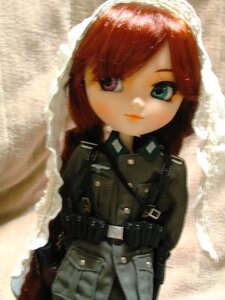 Rating: Safe Score: 0 Tags: 1girl belt blue_eyes blurry closed_mouth depth_of_field doll lips looking_at_viewer red_hair solo suiseiseki upper_body User: admin