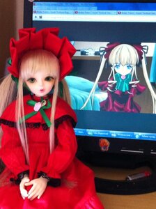 Rating: Safe Score: 0 Tags: 1girl blonde_hair blue_eyes bonnet bow bowtie cup doll dress figure long_hair long_sleeves looking_at_viewer photo red_dress shinku sidelocks sitting solo twintails User: admin