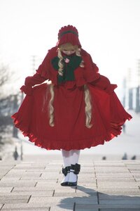 Rating: Safe Score: 0 Tags: 1girl blonde_hair blurry blurry_foreground bonnet depth_of_field dress hat long_sleeves standing User: admin