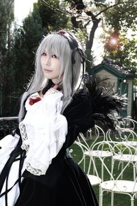 Rating: Safe Score: 0 Tags: 1girl black_dress dress frills gothic_lolita hairband lolita_fashion long_hair solo suigintou User: admin