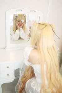 Rating: Safe Score: 0 Tags: 1girl blonde_hair blurry blurry_foreground depth_of_field dress hair_ribbon kirakishou long_hair mirror reflection ribbon sitting solo User: admin