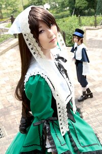 Rating: Safe Score: 0 Tags: 1boy 1girl 3d brown_hair dress green_dress hat long_hair looking_at_viewer multiple_cosplay outdoors smile suiseiseki tagme User: admin