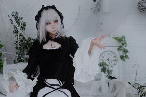 Rating: Safe Score: 0 Tags: 1girl black_dress black_ribbon closed_mouth dress flower frills gothic_lolita hairband lolita_fashion long_hair long_sleeves plant silver_hair solo suigintou vines white_hair User: admin