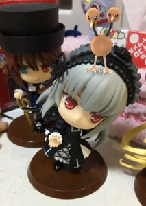 Rating: Safe Score: 0 Tags: 2girls blurry chibi depth_of_field doll dress frills hairband hat heterochromia long_hair looking_at_viewer multiple_dolls multiple_girls red_eyes suigintou tagme User: admin