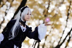 Rating: Safe Score: 0 Tags: 1girl black_ribbon blurry blurry_background depth_of_field dress flower frills gothic_lolita hairband holding lolita_fashion lolita_hairband long_hair long_sleeves ribbon silver_hair solo suigintou very_long_hair User: admin