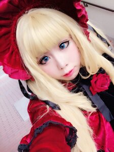 Rating: Safe Score: 0 Tags: 1girl bangs blonde_hair blue_eyes bonnet closed_mouth eyelashes flower lips long_hair looking_at_viewer photo red_rose rose shinku solo upper_body User: admin