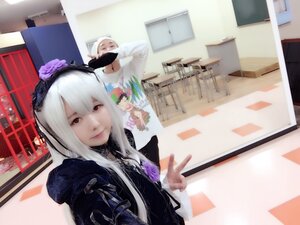 Rating: Safe Score: 0 Tags: 1girl flower hair_ornament long_hair looking_at_viewer photo solo suigintou white_hair User: admin