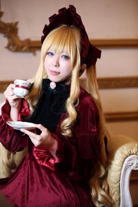 Rating: Safe Score: 0 Tags: 1girl blonde_hair blue_eyes blurry blurry_background bonnet cup depth_of_field dress holding holding_cup indoors lips long_hair looking_at_viewer realistic saucer shinku sitting solo teacup User: admin