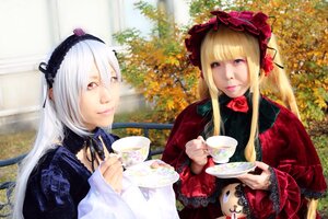 Rating: Safe Score: 0 Tags: 2girls blonde_hair bonnet bow cup flower frills hairband lips long_hair long_sleeves looking_at_viewer multiple_cosplay multiple_girls red_eyes rose saucer shinku silver_hair smile suigintou table tagme tea teacup User: admin