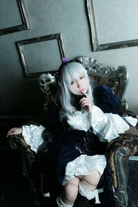 Rating: Safe Score: 0 Tags: 1girl boots dress flower frills gothic_lolita long_hair long_sleeves rose sitting solo suigintou white_hair wide_sleeves User: admin