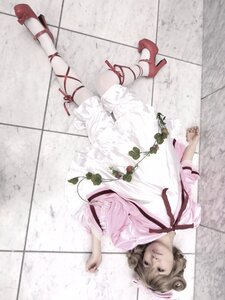 Rating: Safe Score: 0 Tags: 1girl brown_hair dress full_body high_heels hinaichigo lying on_back red_footwear ribbon shoes short_hair solo tiles User: admin