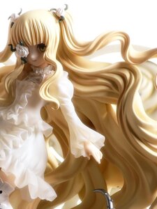 Rating: Safe Score: 0 Tags: 1girl bangs blonde_hair doll dress eyepatch flower frills hair_ornament kirakishou long_hair long_sleeves rose solo striped two_side_up very_long_hair wavy_hair white_dress User: admin