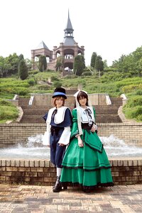 Rating: Safe Score: 0 Tags: 1boy 1girl brown_hair building closed_eyes day dress gate green_dress hat long_sleeves multiple_cosplay outdoors smile tagme top_hat tree User: admin