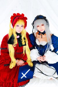 Rating: Safe Score: 0 Tags: 2girls blonde_hair dress frills hairband lips long_hair long_sleeves multiple_cosplay multiple_girls red_eyes shinku siblings silver_hair sitting suigintou tagme User: admin