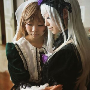 Rating: Safe Score: 0 Tags: 2girls blonde_hair blurry closed_eyes depth_of_field dress lips long_hair long_sleeves multiple_cosplay multiple_girls suigintou tagme User: admin