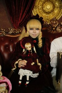 Rating: Safe Score: 0 Tags: 1girl blonde_hair blue_eyes bow curtains dress flower long_hair long_sleeves looking_at_viewer red_dress shinku sitting solo twintails User: admin