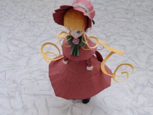 Rating: Safe Score: 0 Tags: 1girl bangs blonde_hair blue_eyes bonnet bow bowtie capelet doll dress flower flying full_body green_bow long_hair long_sleeves looking_at_viewer red_dress rose shinku solo standing twintails very_long_hair User: admin