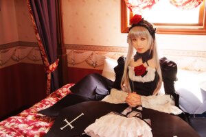 Rating: Safe Score: 0 Tags: 1girl black_dress curtains dress flower frills long_hair long_sleeves looking_at_viewer rose silver_hair sitting solo suigintou User: admin